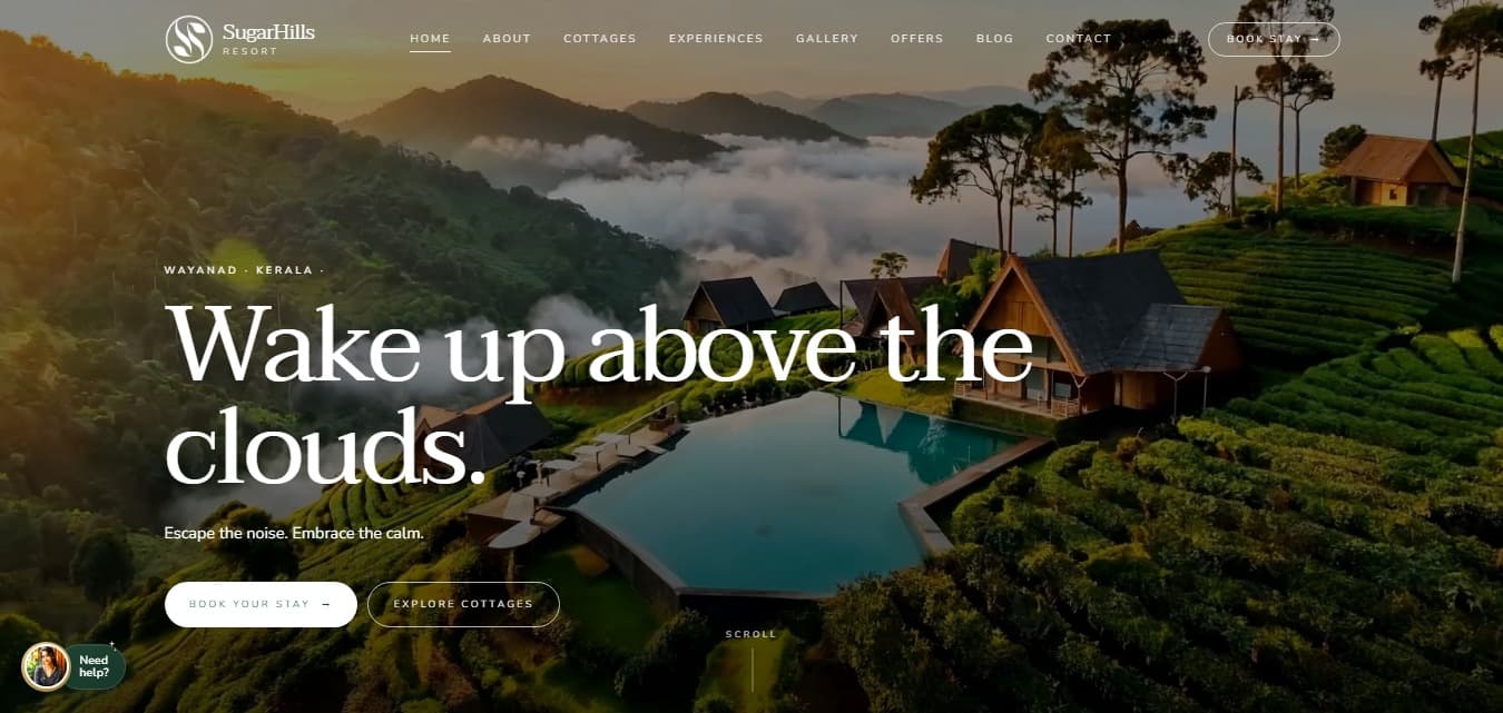 SugarHills Resort homepage — hilltop cottages above the clouds in Wayanad with the headline “Wake up above the clouds.”